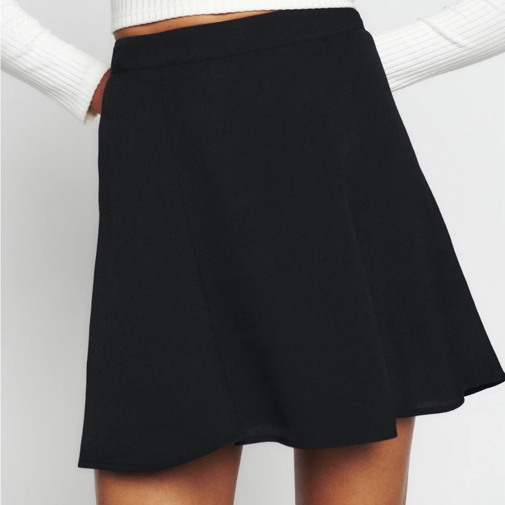 Reformation black mini skirt, worn once, size 4 (Small)